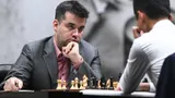 Русский шахматист мог выиграть 1-ю же партию Матча за звание чемпиона мира. Но его соперник надел куртку и спасся