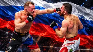 Петр Ян дожал Двалишвили в трилогии! Волков побил Куниева, Евлоев проиграл нокаутом. Лучшие фото с UFC в Абу-Даби