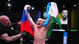 Выходящий в США с флагом России боец UFC рассказал, как к этому относятся в Америке